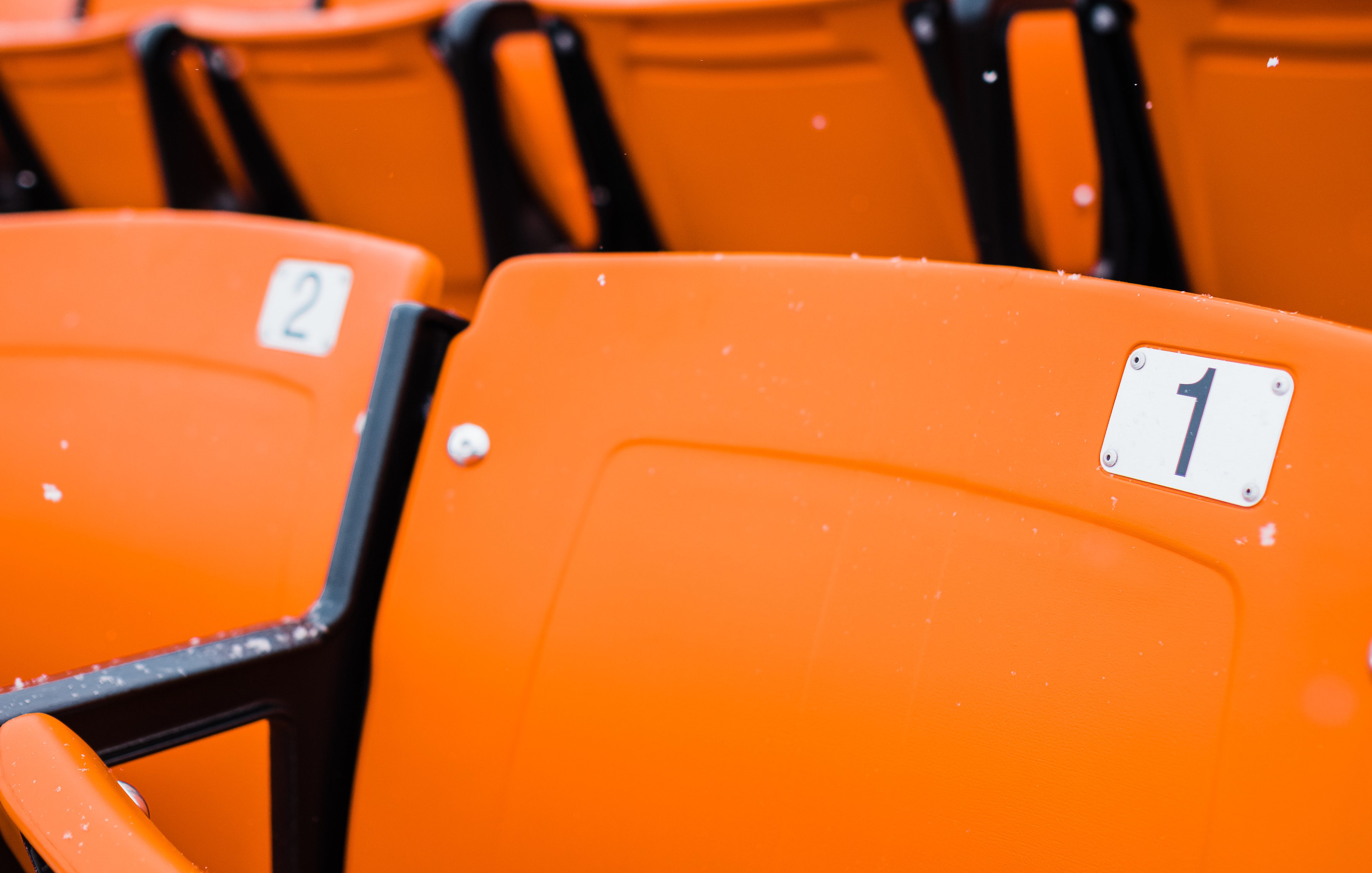 Orange chairs with numbers